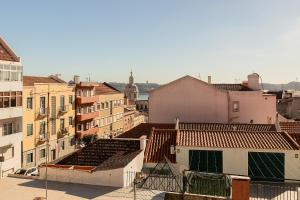 an aerial view of a city with buildings at Belem Design Apartments by Homing in Lisbon