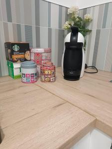 a coffee maker sitting on top of a wooden table at Orotava Bliss Z in La Orotava +2 photos