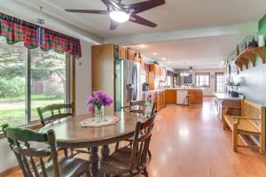 cocina y comedor con mesa y sillas en Big Stone Lake Retreat Near Browns Valley!, 