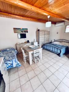 Postel nebo postele na pokoji v ubytování Casa Vacanza Delfino Azzurro - Noto Marina -