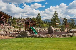 a playground with a slide in a yard with rocks at Tamarron Gambel Oak 790 - Wild Turkey Ridge - Durango CO in Coffeyville