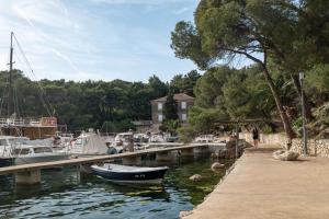 a group of boats docked at a marina at Cozy Apartment with Private Terrace in Mandre