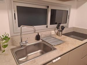 Kuchyň nebo kuchyňský kout v ubytování IL Fiume - Exclusivo departamento Premium con Vista al Río + 40 fotografií