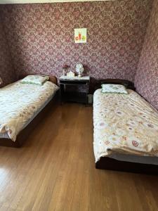 Postel nebo postele na pokoji v ubytování 湯姐家