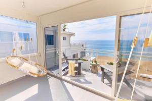 a balcony with a view of the ocean at Laguna Surf Lodge by SCP Hotels in Laguna Beach