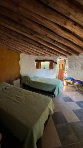 Кровать или кровати в номере Habitación en Casa Ecológica