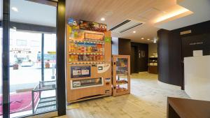a vending machine in a grocery store with at Hotel New Gaea Yanagawa in Yanagawa +36 photos