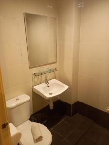 Koupelna v ubytování Syajie Koptown Hotel