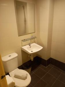 Koupelna v ubytování Syajie Koptown Hotel