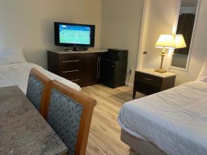 TV a/nebo společenská místnost v ubytování Searay - Motel