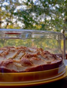 a cake in a glass dish on a table at B&B Notti Serene in Allumiere