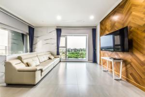 TV a/nebo společenská místnost v ubytování Gladsheim Hotel