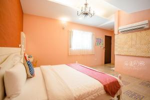 Postel nebo postele na pokoji v ubytování Hai Yuan Bungalow II