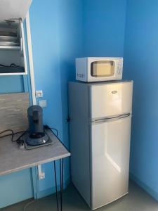 Kuchyň nebo kuchyňský kout v ubytování les moulins - chambre 1