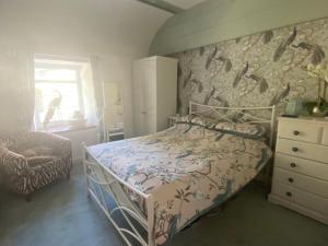 Ένα ή περισσότερα κρεβάτια σε δωμάτιο στο The chapel