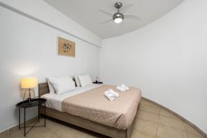 Кровать или кровати в номере Villa Zafira - Seaview Manor with Heated Pool