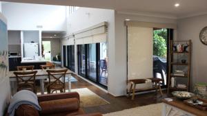 a living room with a couch and a table at Pet Friendly With Privacy, Excellence & Wifi in Hawks Nest