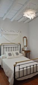 Giường trong phòng chung tại Las Hazuelas Villa 15