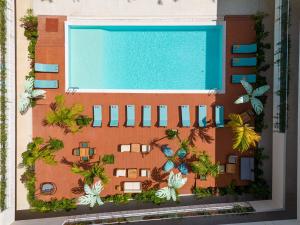 a model of a resort with a swimming pool at Samawa Living in Paje
