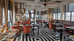 Restoran või mõni muu söögikoht majutusasutuses Minerva Premium Hotel