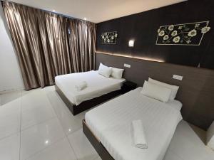 Letto o letti in una camera di One Point Hotel