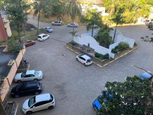 an aerial view of cars parked in a parking lot at Seabreeze suites Villa in Diani Beach
