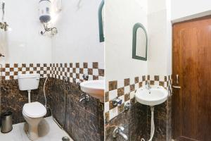 Khagaul的住宿－FabExpress Magadh Glory，一间带卫生间和水槽的浴室