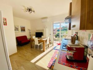 TV a/nebo společenská místnost v ubytování Way2Rome Apartments