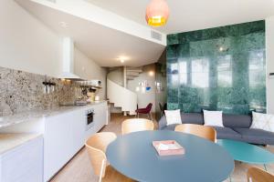 Kuchyň nebo kuchyňský kout v ubytování Aspasios City Oasis Apartments