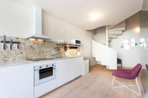 Kuchyň nebo kuchyňský kout v ubytování Aspasios City Oasis Apartments