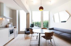 Kuchyň nebo kuchyňský kout v ubytování Aspasios City Oasis Apartments