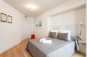 Postel nebo postele na pokoji v ubytování Aspasios City Oasis Apartments