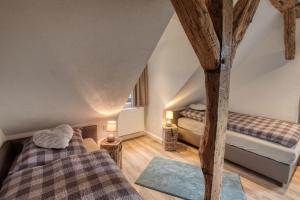 Postel nebo postele na pokoji v ubytování Michels Mühle - wieder Land sehen