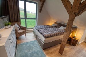 Postel nebo postele na pokoji v ubytování Michels Mühle - wieder Land sehen