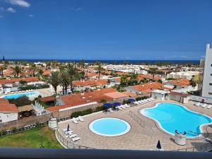 an aerial view of a resort with a swimming pool at Casa Bonita Vista - Playa del Inglés in Playa del Ingles