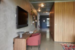 TV a/nebo společenská místnost v ubytování Hotel GUESTapart