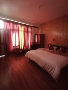 Postel nebo postele na pokoji v ubytování Hotel New Gyespa