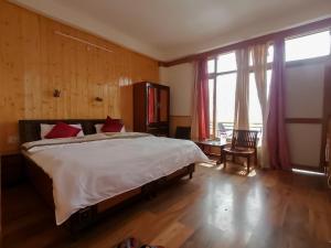 Postel nebo postele na pokoji v ubytování Hotel New Gyespa
