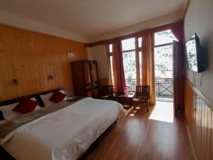 Postel nebo postele na pokoji v ubytování Hotel New Gyespa