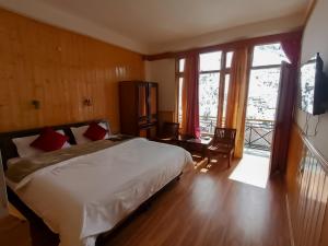 Postel nebo postele na pokoji v ubytování Hotel New Gyespa
