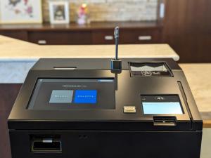 a computer printer sitting on top of a table at Hotel Naha City -Kokusai Street- in Naha