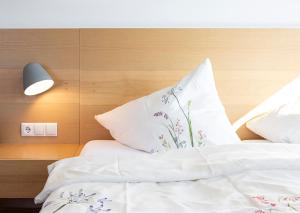 Postel nebo postele na pokoji v ubytování Hotel & Wirtschaft Wälderhof