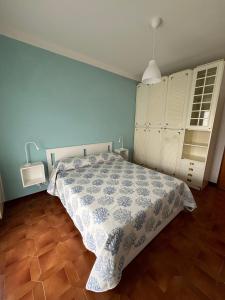 Ένα ή περισσότερα κρεβάτια σε δωμάτιο στο Appartamento Carla