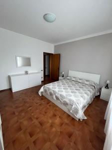 Ένα ή περισσότερα κρεβάτια σε δωμάτιο στο Appartamento Carla