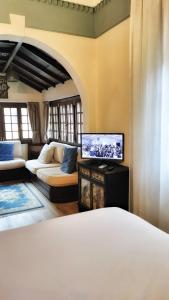Postel nebo postele na pokoji v ubytování Bed&Breakfast Villa Devoto" La Torretta"