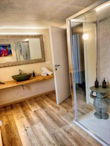 a bathroom with a sink and a mirror at Bed&Breakfast Villa Devoto" La Torretta" in Rapallo +23 photos