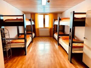 Postel nebo postele na pokoji v ubytování Jugendhotel Eissee