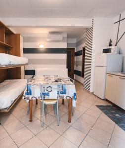 A kitchen or kitchenette at Residence Corallo