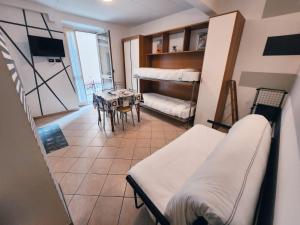 A bed or beds in a room at Residence Corallo