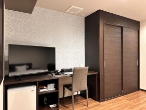 TV a/nebo společenská místnost v ubytování Reftel Osaka Itami Airport Hotel + 18 fotografií